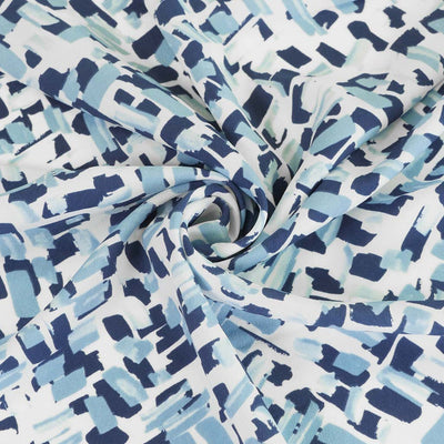 Mitaki - Blue Fragments Crepe de Chine Woven Fabric Detail Swirl Image from Patternsandplains.com