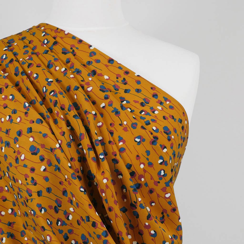 Monroe - Maize Yellow Seedlings Woven Crepe Fabric Mannequin Close Up Image from Patternsandplains.com