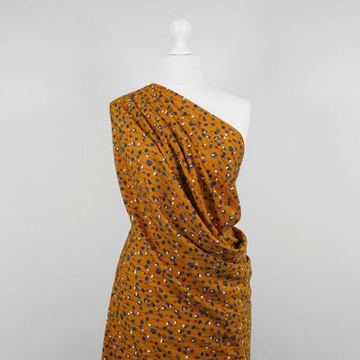 Monroe - Maize Yellow Seedlings Woven Crepe Fabric Mannequin Wide Image from Patternsandplains.com