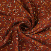 Monroe - Rust Jumbled Woven Crepe Fabric Detail Swirl Image from Patternsandplains.com