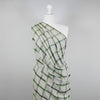 Nairn - Green Yarn Dyed Asymmetrical Plaid Woven Fabric Mannequin Wide Image from Patternsandplains.com