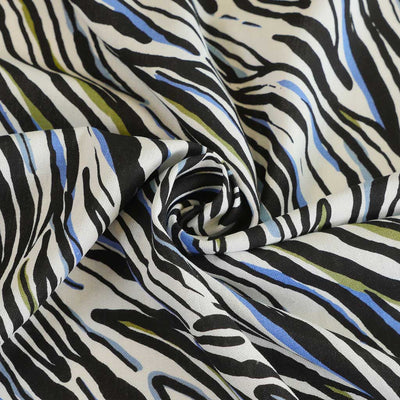 Palermo - Blue Ebb & Flow Viscose Linen Woven Fabric Detail Swirl Image from Patternsandplains.com