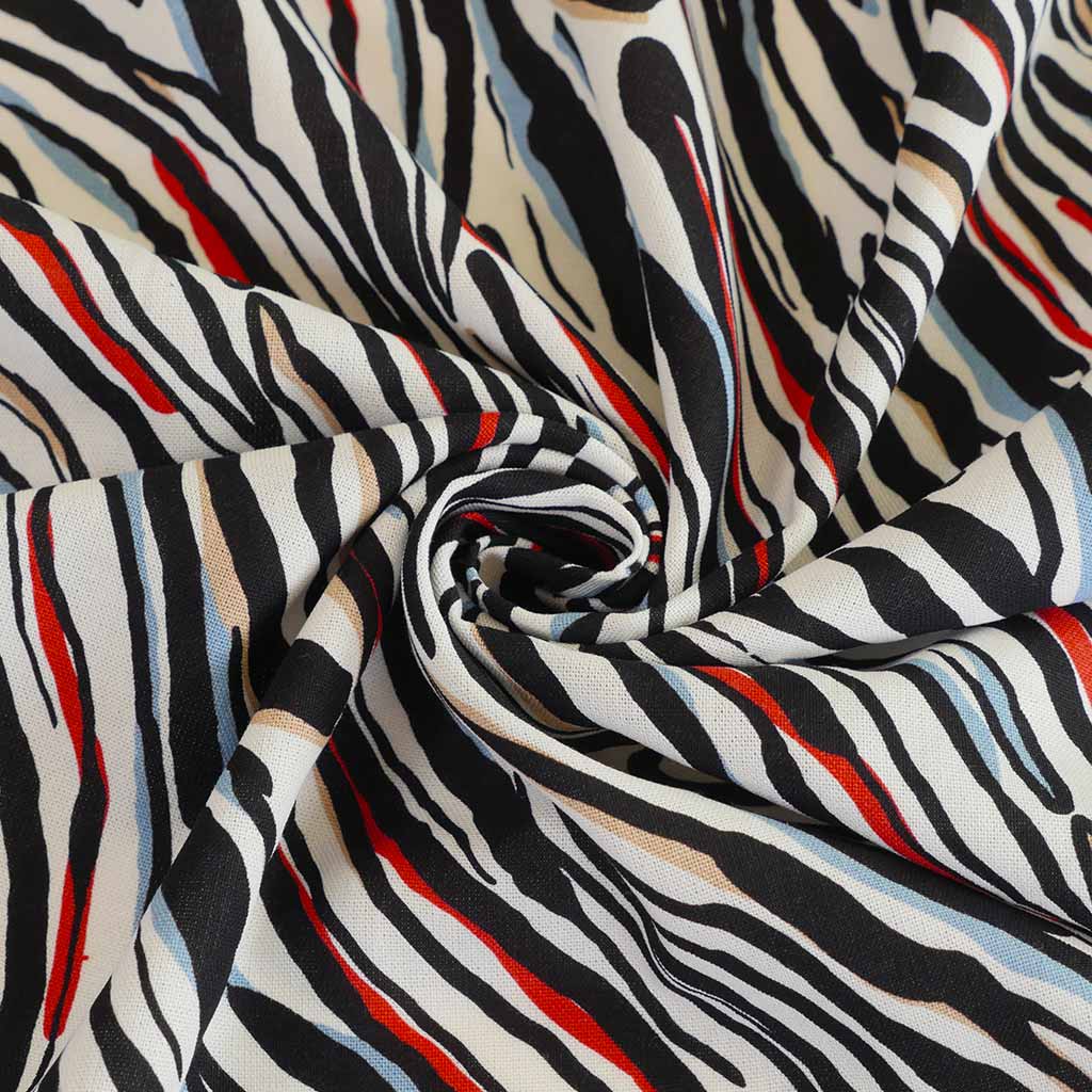 Palermo - Red Ebb & Flow Viscose Linen Woven Fabric Detail Swirl Image from Patternsandplains.com