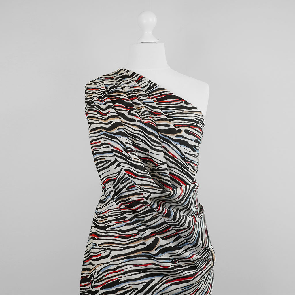 Palermo - Red Ebb & Flow Viscose Linen Woven Fabric Mannequin Wide Image from Patternsandplains.com