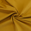 Rome Ochre Yellow Viscose Rich Heavy Ponte de Roma Stretch Fabric Detail Swirl Image from Patternsandplains.com