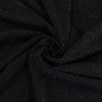 Sparks - Black Scuba Crepe Stretch Fabric Detail Swirl Image from Patternsandplains.com