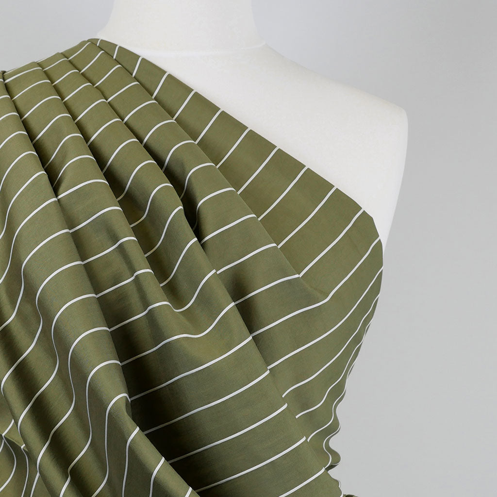 Vancouver - Olive Green Rails Jacquard Stripe Woven Fabric Mannequin Close Up Image from Patternsandplains.com