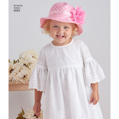 Simplicity Pattern 8563 Toddler Dresses and Hat Image 1 From Patternsandplains.com